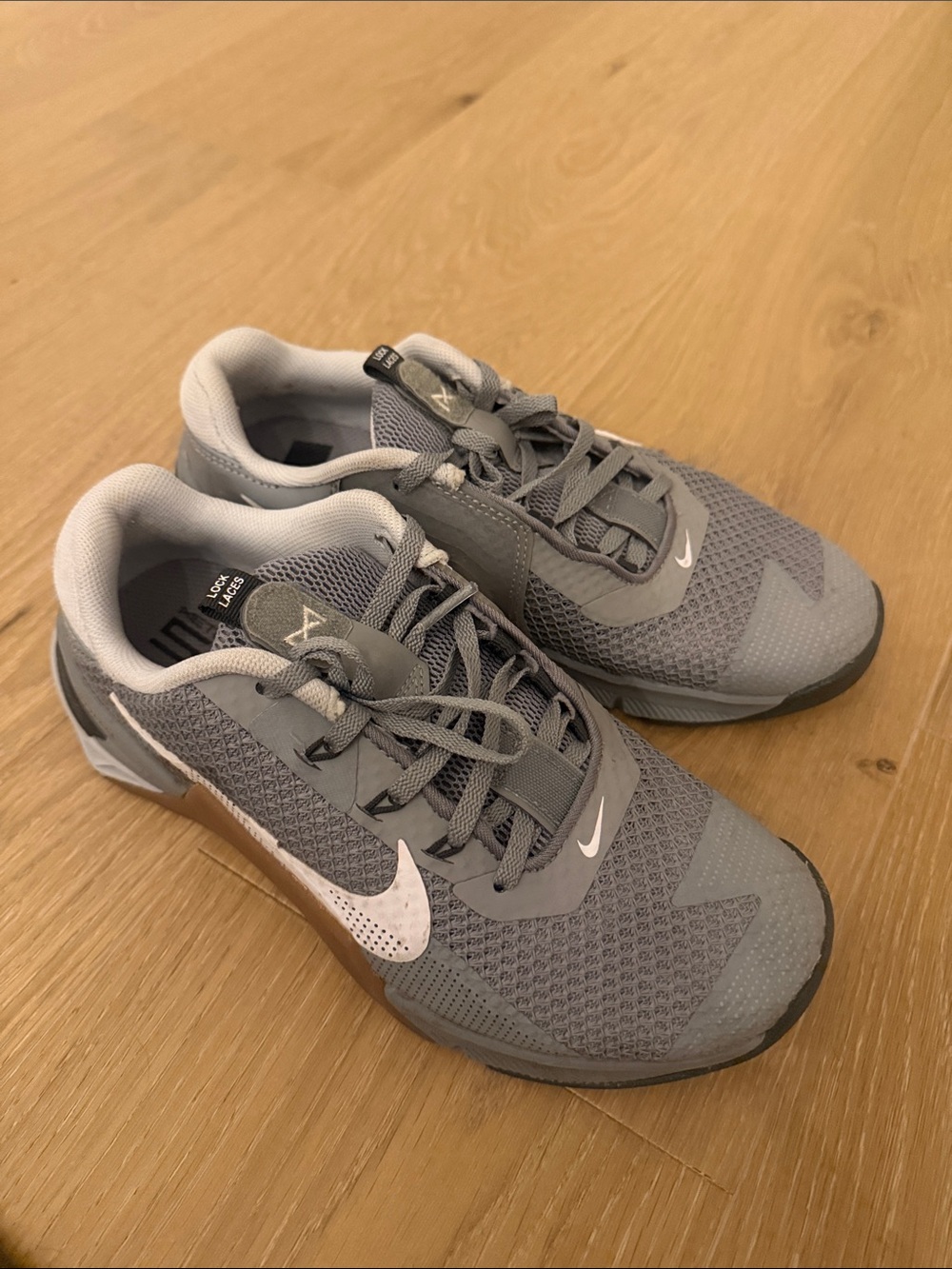 Nike Men’s Gray Mesh Athletic Sneakers with White Swoosh